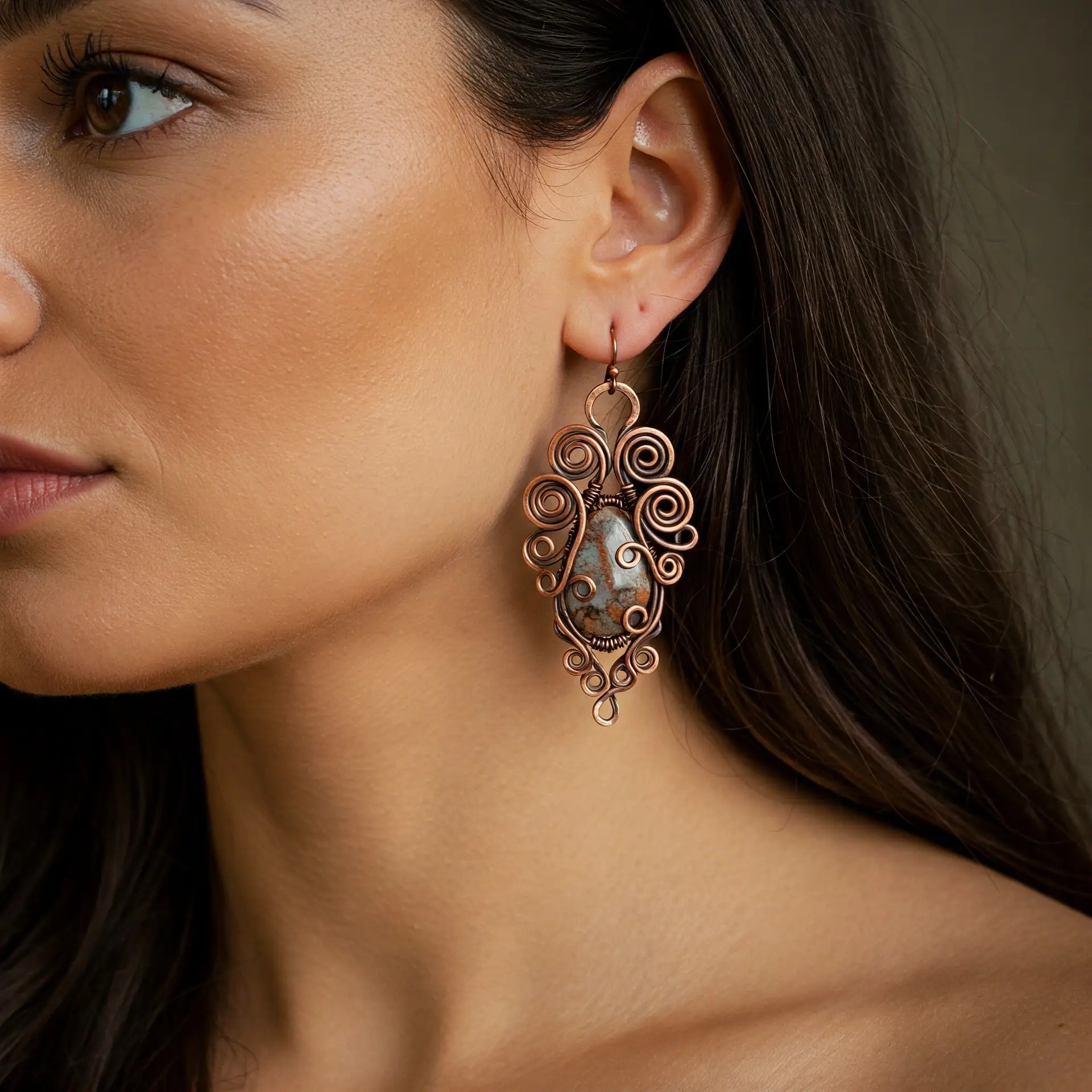 women wearing artisanal copper wire earrings
